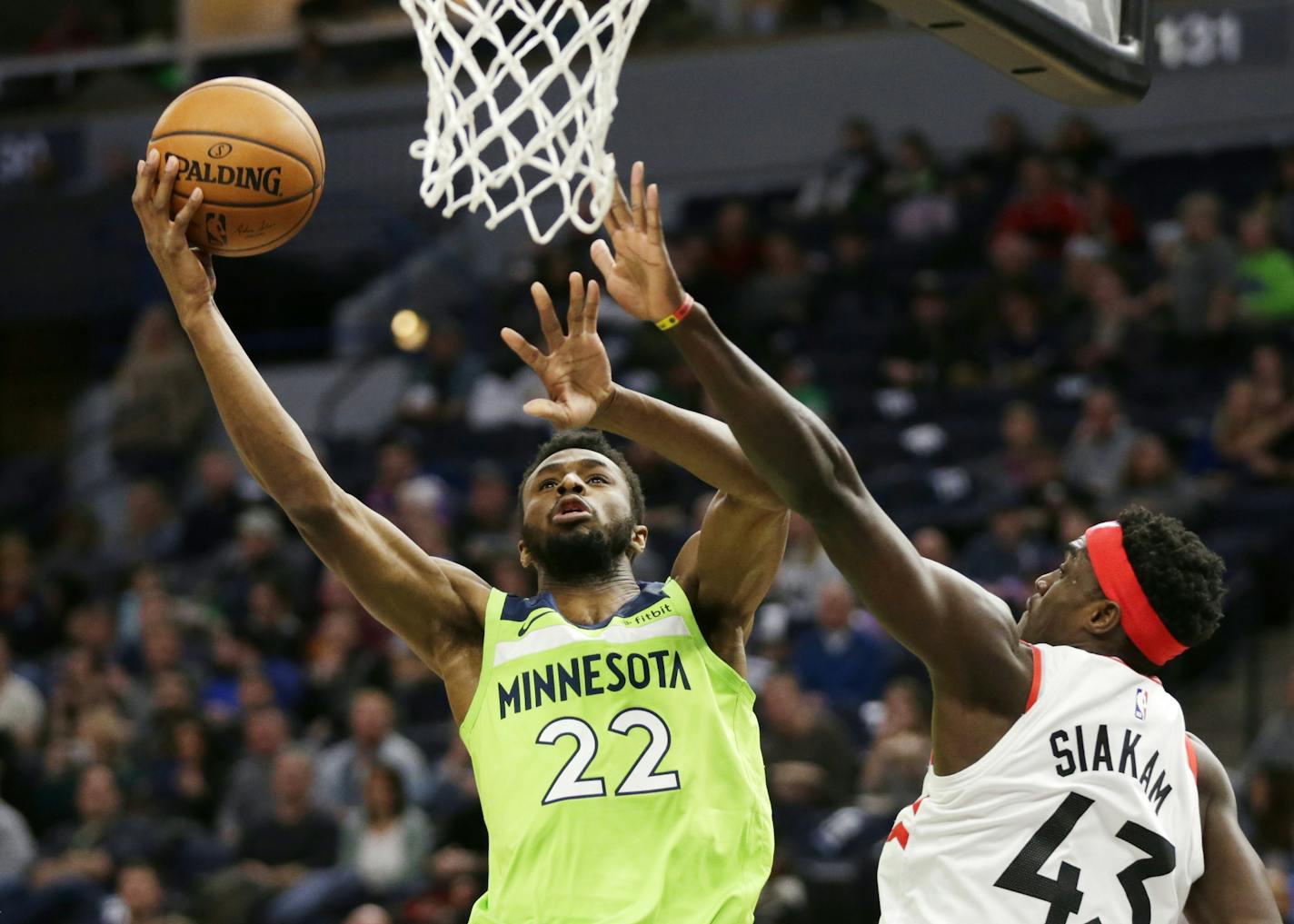 Minnesota Timberwolves forward Andrew Wiggins (22) shoots against Toronto Raptors forward Pascal Siakam (43) in the second quarter of an NBA basketball game Saturday, Jan. 18, 2020, in Minneapolis. (AP Photo/Andy Clayton-King)