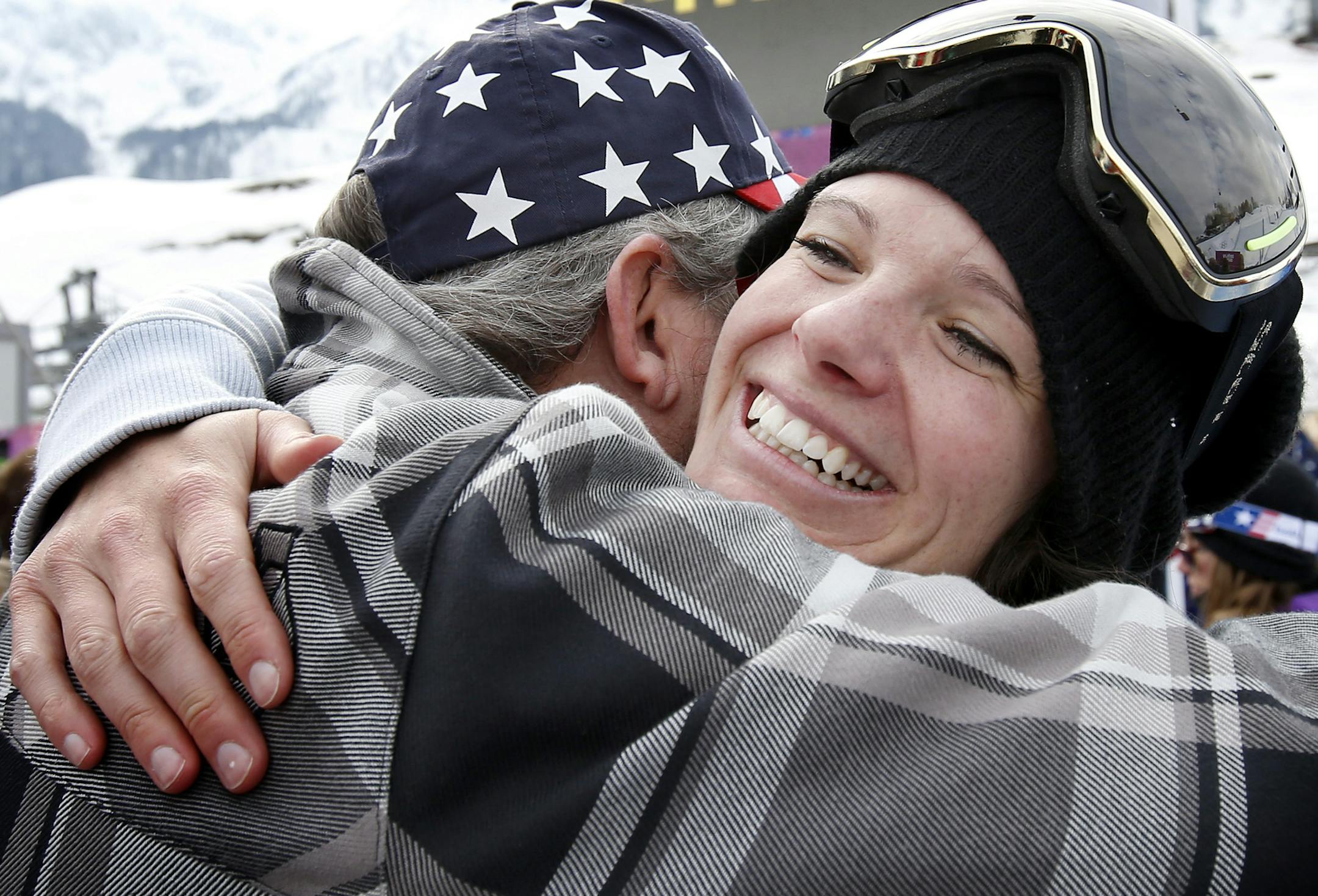 Keri Herman got a hug from her father John Herman after the women's ski slopestyle finals. Herman finished in 10th place. ] CARLOS GONZALEZ cgonzalez@startribune.com - February 11, 2013, Krasnaya Polyana, Russia, Sochi 2014 Winter Olympics, Rosa Khutor Extreme Park, Women's Ski Slopestyle