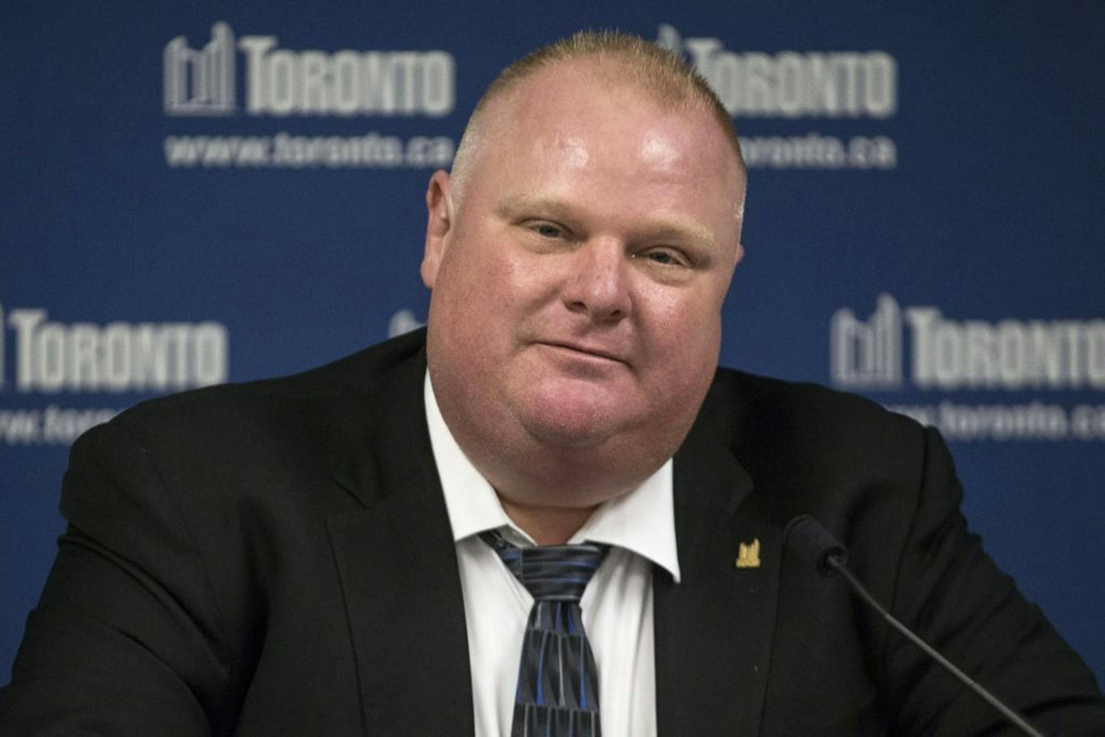 Toronto Mayor Rob Ford reads a statement to the media at City Hall on Friday, May 24, 2013 in Toronto. Ford denied that he smokes crack cocaine and says he is not an addict after a video purported to show him using the drug. Ford did not say whether he has ever used the drug.