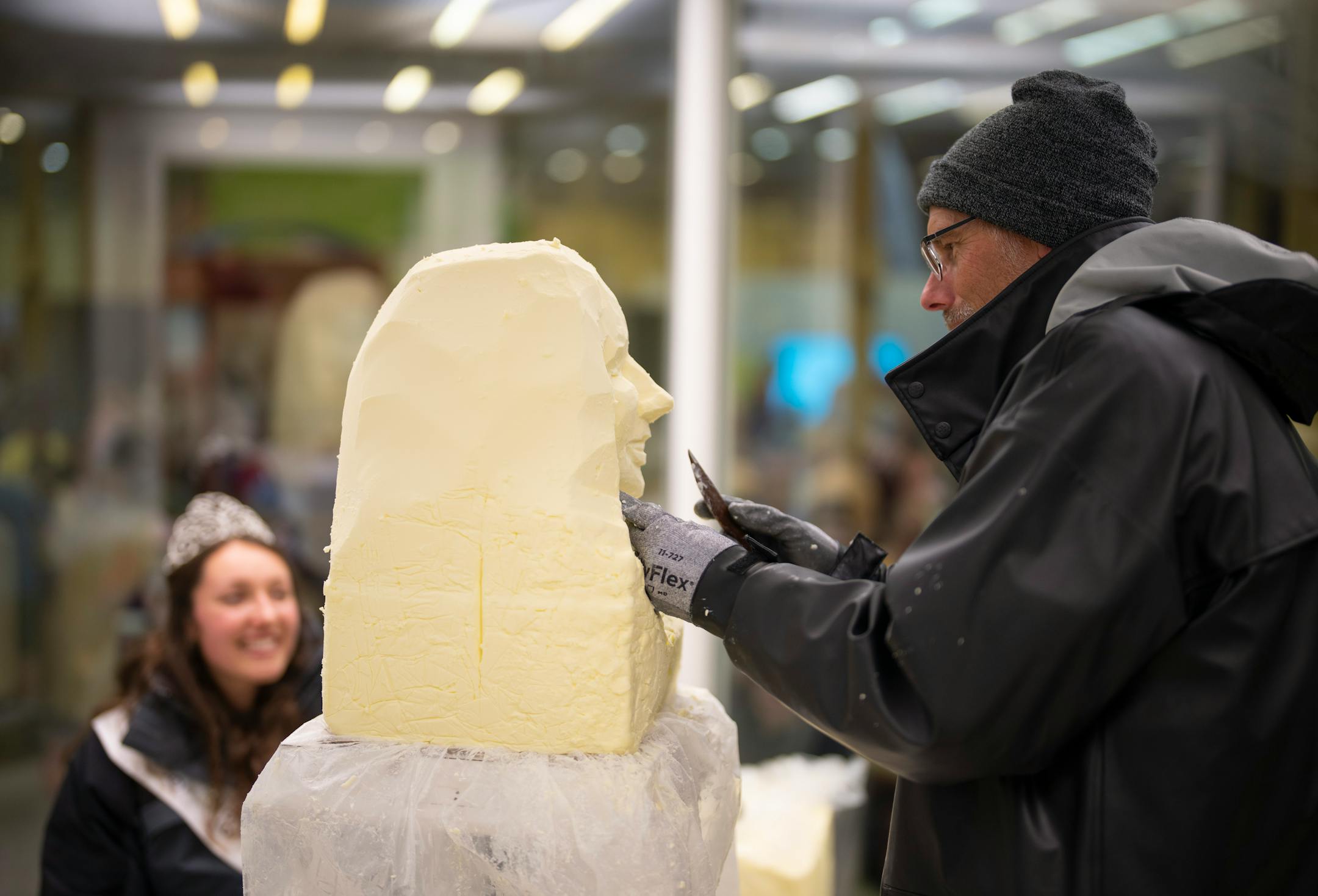 Gerry Kulzer worked on sculpting the likeness of Rachel Rynda, the 69th Princess Kay of the Milky Way out of a 90 lb. block of butter Thursday afternoon in the Dairy Building on the first day of the Minnesota State Fair.