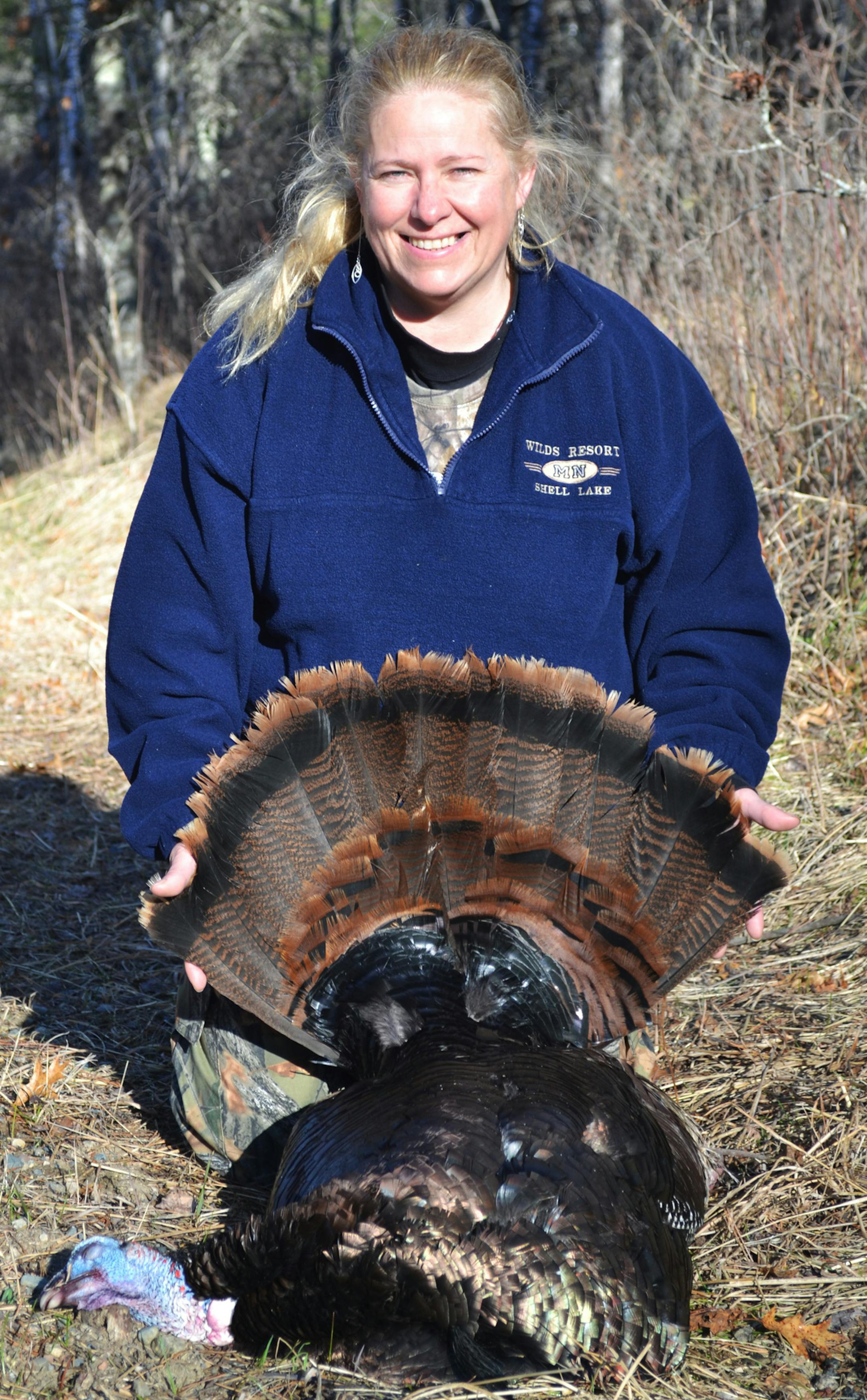 FIRST BIRD Cheryl Olson bagged a turkey on her first-ever turkey hunt last spring, part of a mentored hunt sponsored by the Department of Natural Resources and National Wild Turkey Federation. The program has been expanded this year to include men. Photo by Kristi Coughlon, DNR