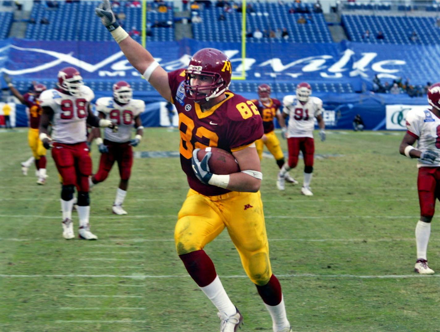 Gopher receiver Ben Utecht celebrated a touchdown in the 2002 Music City Bowl.