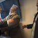 Imam Sheikh Sa&#x2019;ad Musse Roble, alongside Imam Ahmed Burale (right), had a warm greeting for U.S. Attorney Andy Luger before a Somali community 