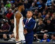 Ryan Saunders and Andrew Wiggins talked during the second half on Wednesday night.
