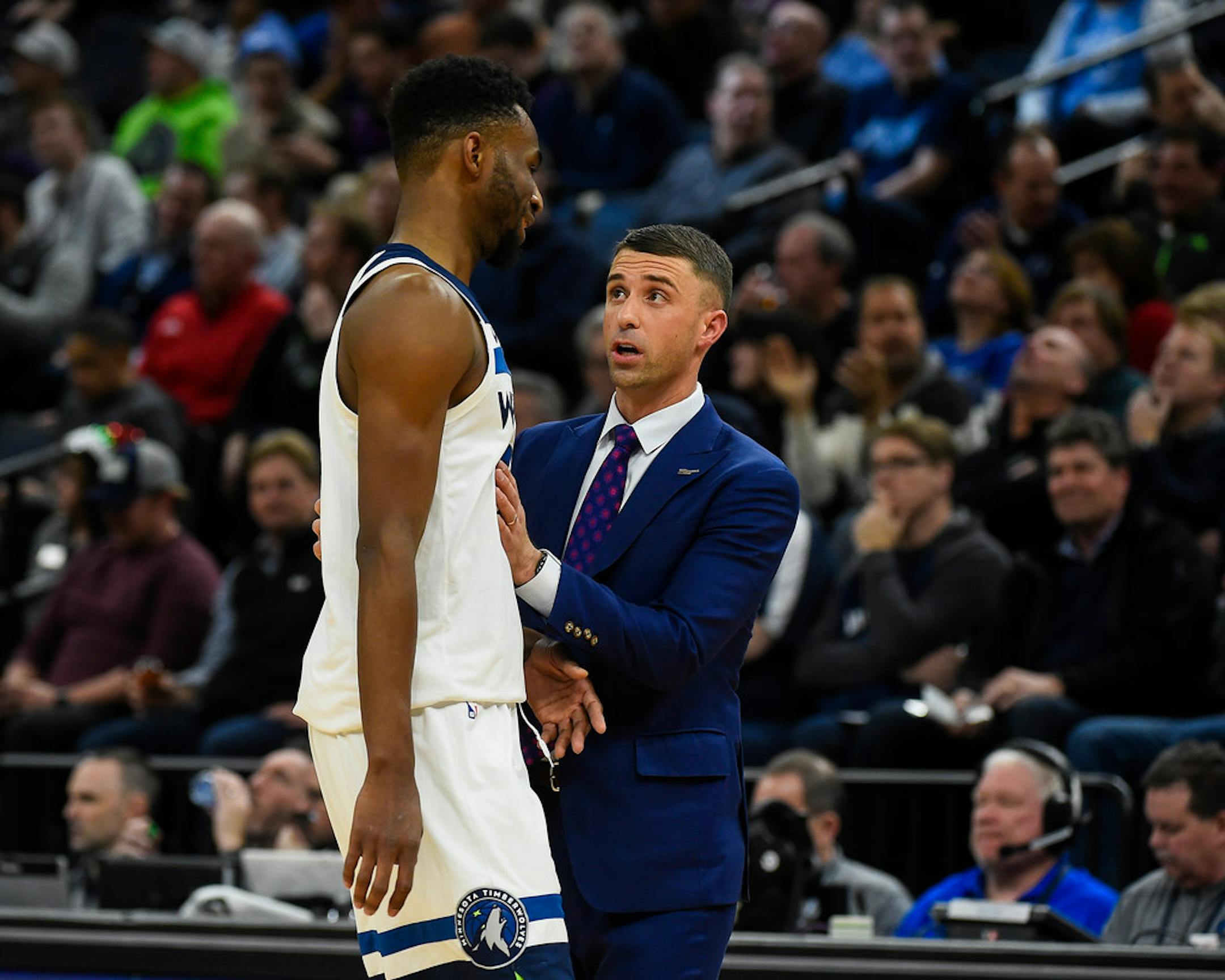 Ryan Saunders and Andrew Wiggins talked during the second half on Wednesday night.