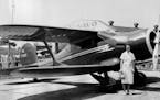 May 30, 1937 Mrs. Louise Thaden, winner of the Bendix and Harmon Trophies last year, beside the plane in which she set a new speed record for women at