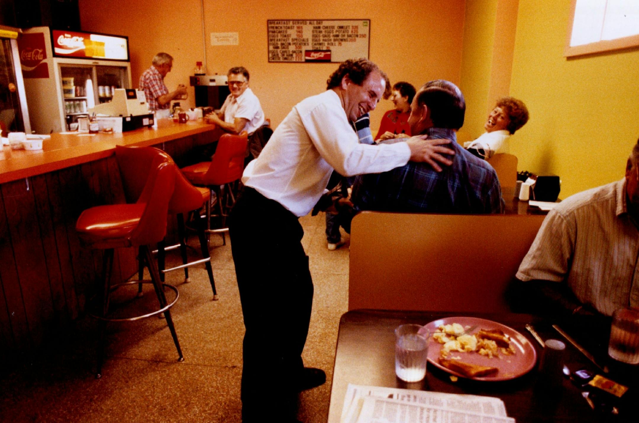 November 11, 1990: U.S. Senate Candidate Paul Wellstone left his breakfast unfinished greeting guests at Mike's Cafe in Hibbing.