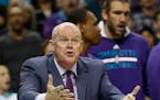Charlotte Hornets coach Steve Clifford argues an official's call as Charlotte plays the Minnesota Timberwolves in the second half of an NBA basketball