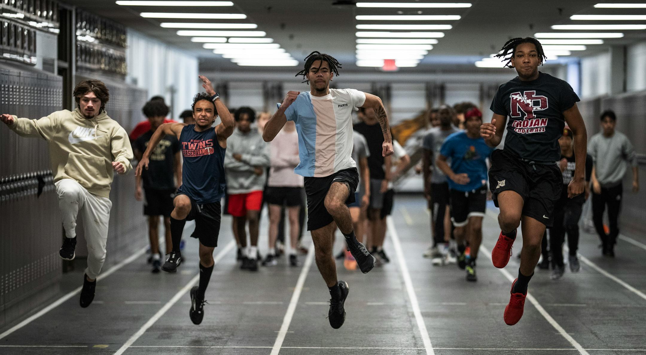 Apple Valley boys track and field team members filled the hallways at school during morning practice.