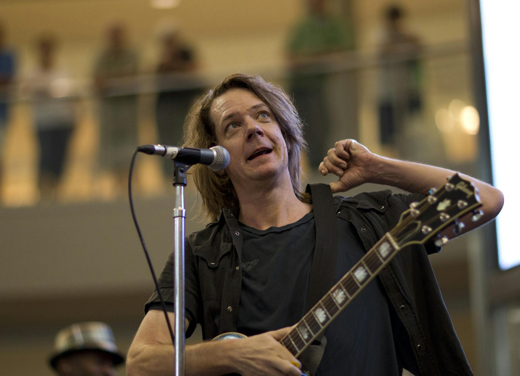 Minneapolis rock stalwarts Soul Asylum played a seven song set in the rotunda of the Mall of Americain Bloomington, Minn. Tuesday evening, July 17, 2012 to mark the release of their latest studio album, "Delayed Reaction." Dave Pirner, one of the founding members of Soul Asylum, during the band's set Tuesday evening at the Mall of America. ] JEFF WHEELER ‚Ä¢ jeff.wheeler@startribune.com ORG XMIT: MIN2013071614494261