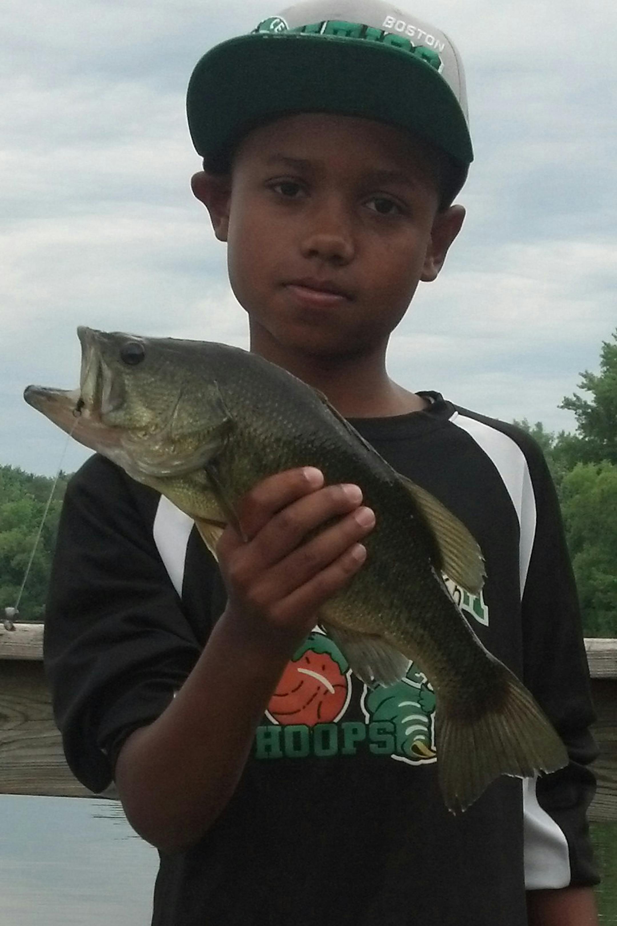 PIER PRESSURE Langston Edlund, 10, of Edina, caught this largemouth bass at Lake Ann in Chanhassen off the fishing pier. ‚ÄúI had already reeled my line in after a fun day of fishing, and I asked Langston to bring his line in, too,‚Äô‚Äô said Langston‚Äôs dad, Paul. ‚ÄúIt was right then that this big fella went after Langston‚Äôs sucker minnow. After a few photo's we released the fish.‚&#