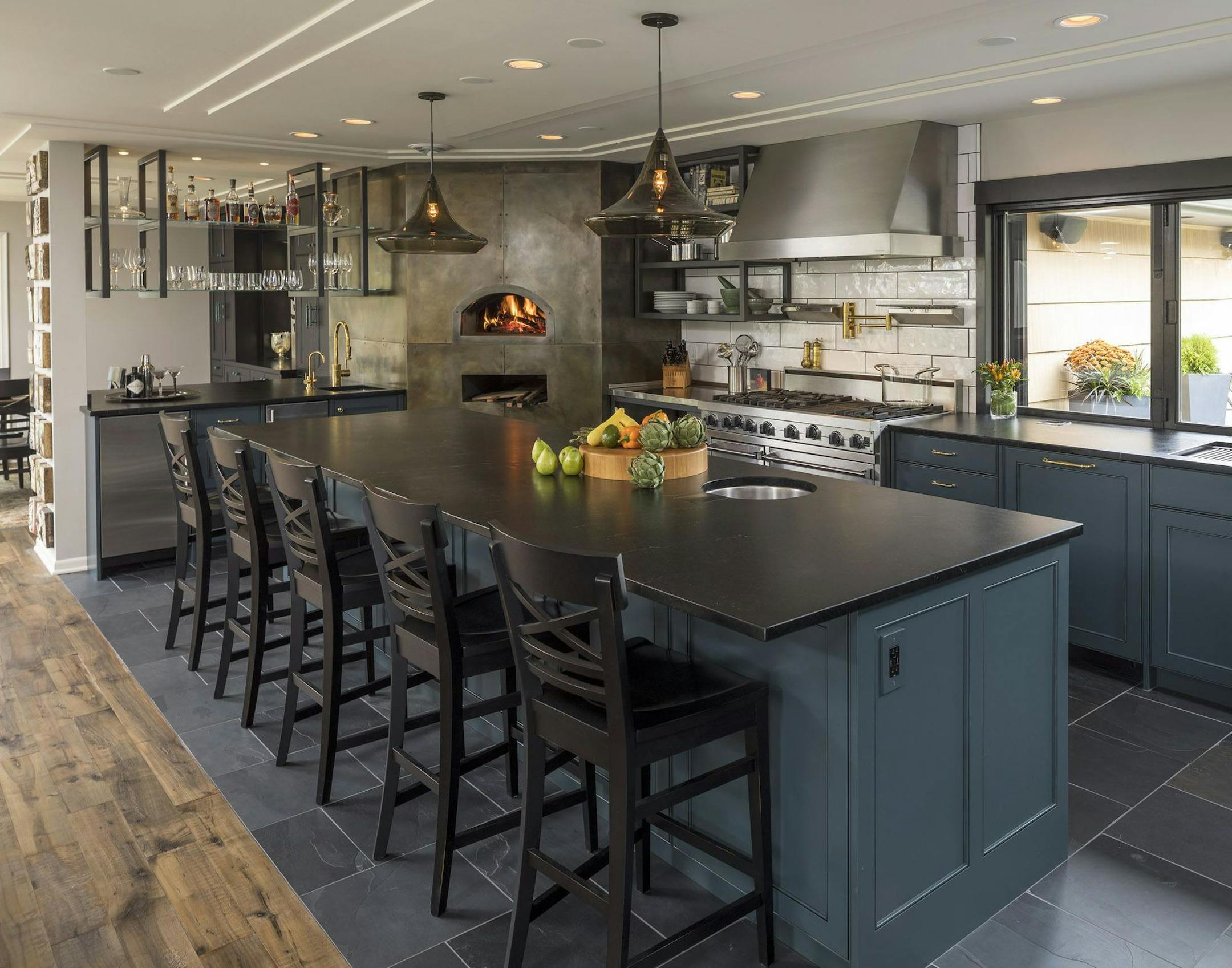 Empty nester couple turned their 1950s suburban abode into open and modern loft-like spaces, featured on the Luxury Remodeling Tour in June.