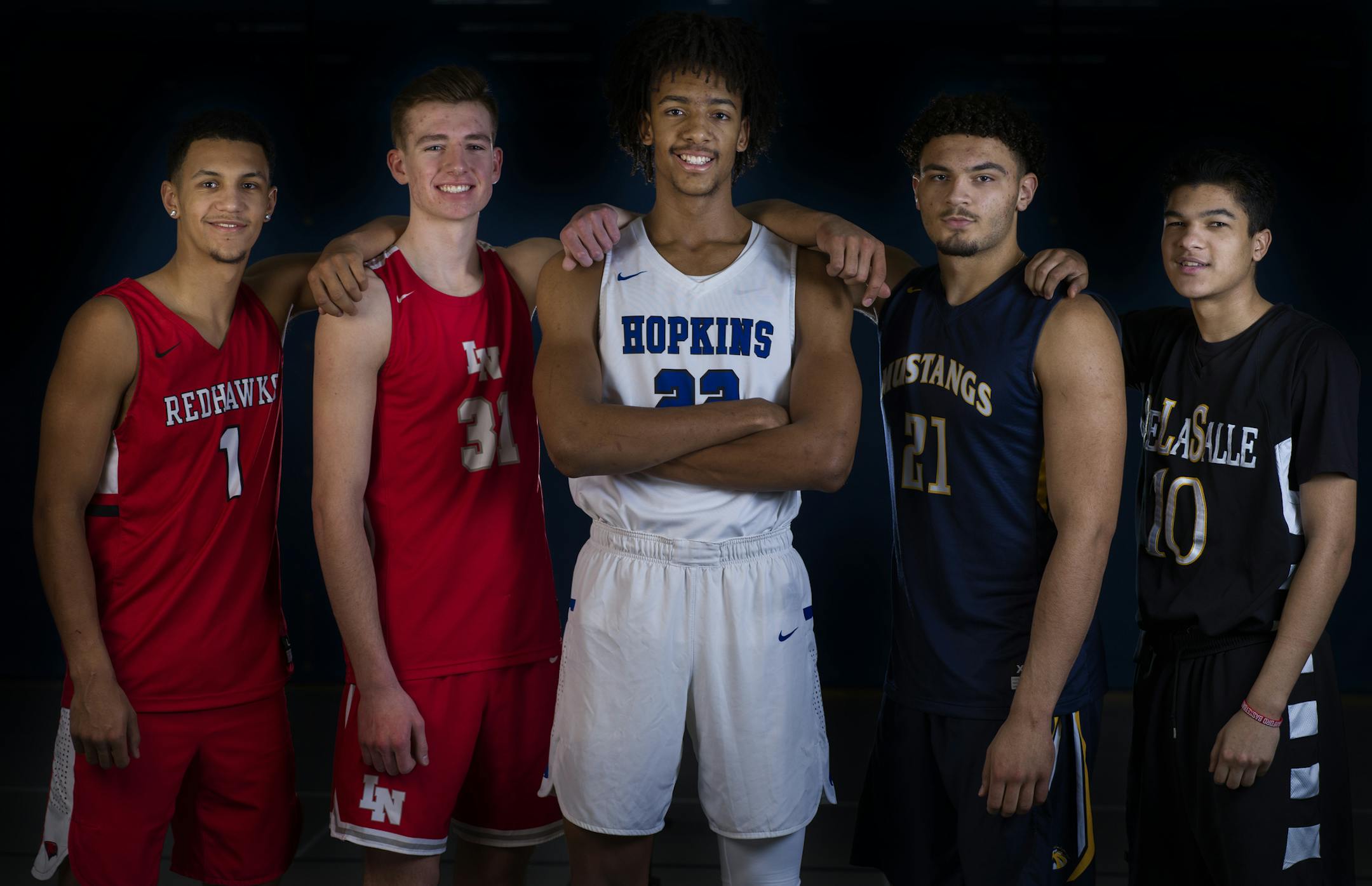Boys' basketball first team includes Zeke Nnaji, of Hopkins H.S.(center) Jalen Suggs, Minnehaha, far left. Tyler Wahl, Lakeville second from left. David Roddy, Breck, fourth from left. Tyrell Terry, DeLaSalle, far right.] Boys' basketball first team and player of the year. First team:
Jalen Suggs, Minnehaha
Tyrell Terry, DeLaSalle
David Roddy, Breck
Tyler Wahl, Lakeville NorthRICHARD TSONG-TAATARII &#xa5; richard.tsong-taatarii@startribune.com