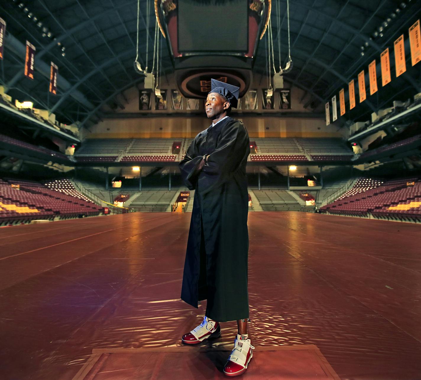 Willie Burton &#x2014; wearing maroon hightops &#x2014; will walk across a stage Saturday and receive his degree in multidisciplinary studies from the U&#x2019;s College of Continuing Education.