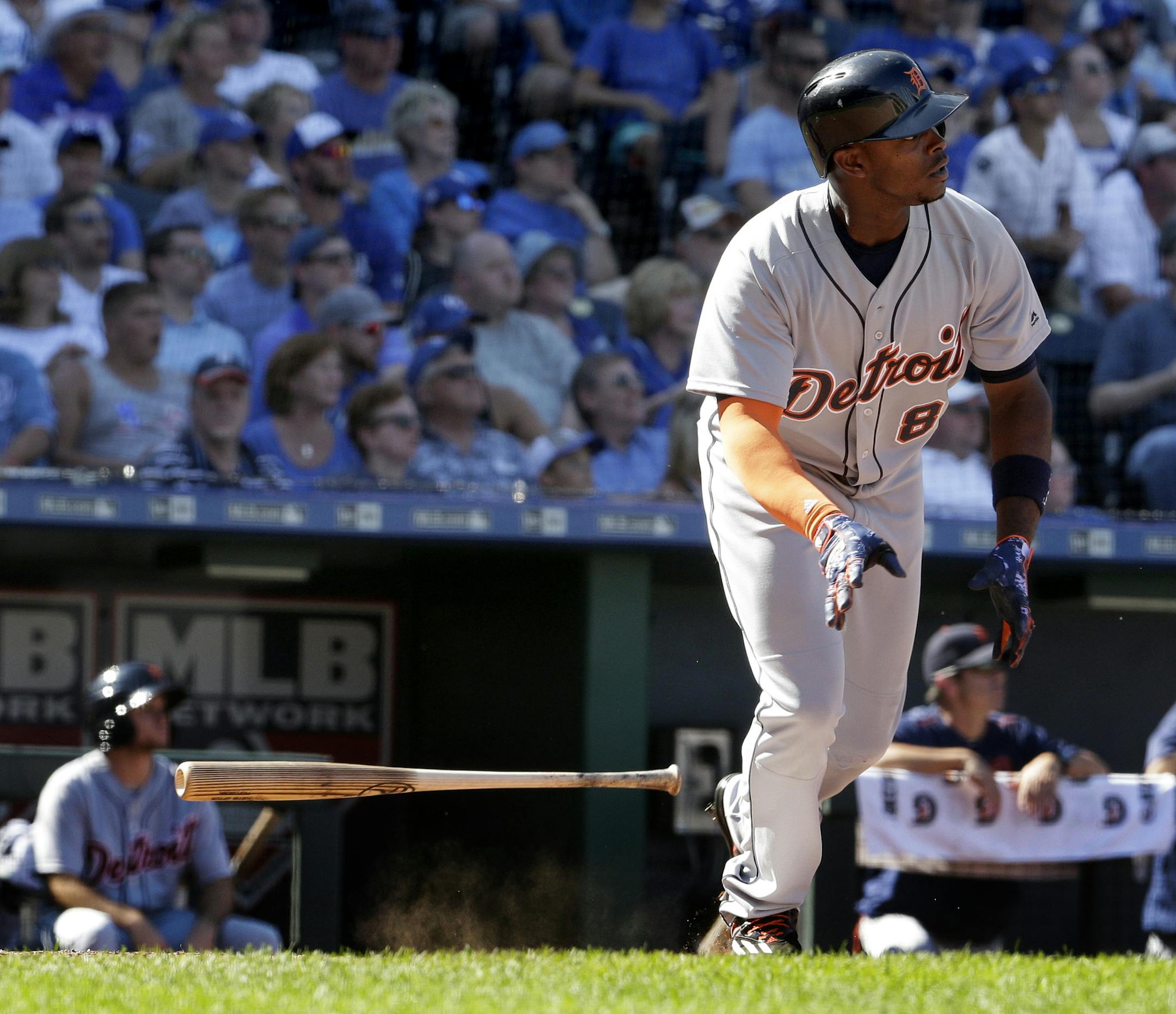 Detroit Tigers' Justin Upton (8) watches his two-run home run during the eighth inning of a baseball game against the Kansas City Royals, Sunday, Sept. 4, 2016, in Kansas City, Mo. (AP Photo/Charlie Riedel)