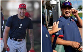 Twins closer Jhoan Duran (left) and Twins Hall of Famer Johan Santana (right) have been seen working together this spring training - a terrifying thou