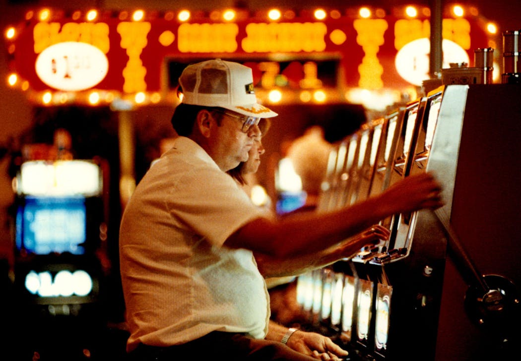 A man played a quarter slot machine at Jackpot Junction Casino in Morton, Minn. in 1991. The casino opened in 1988.