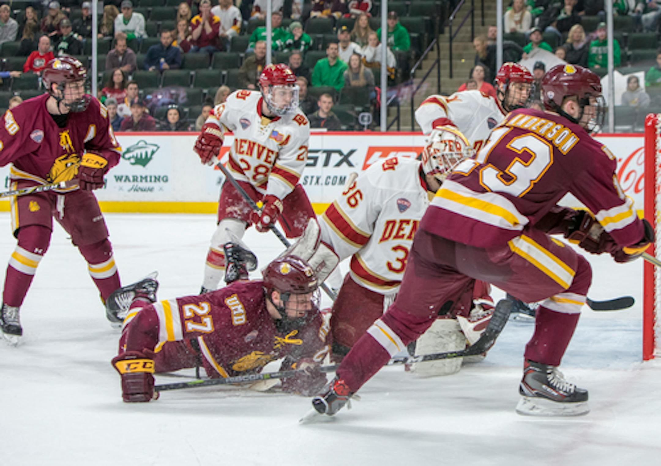 Minnesota Duluth Bulldogs and Denver, shown last year in the NCHC Frozen Faceoff semifinals at Xcel Energy Center, are familiar opponents. They meet in Friday's 7:30 p.m. semfinal in St. Paul.