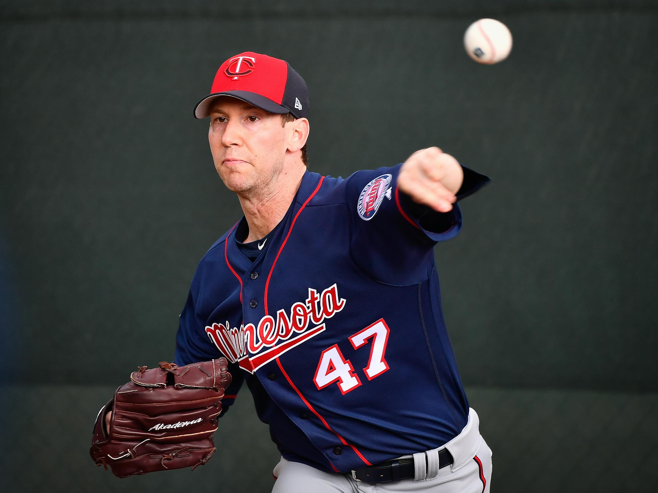 Twins relief pitcher Craig Breslow (47) threw the ball in the bullpen during spring training workouts.