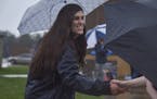 Danica Roem, who is running for house of delegates against GOP incumbent Robert Marshall, campaigns as voters take to the ballot boxes at Gainesville 