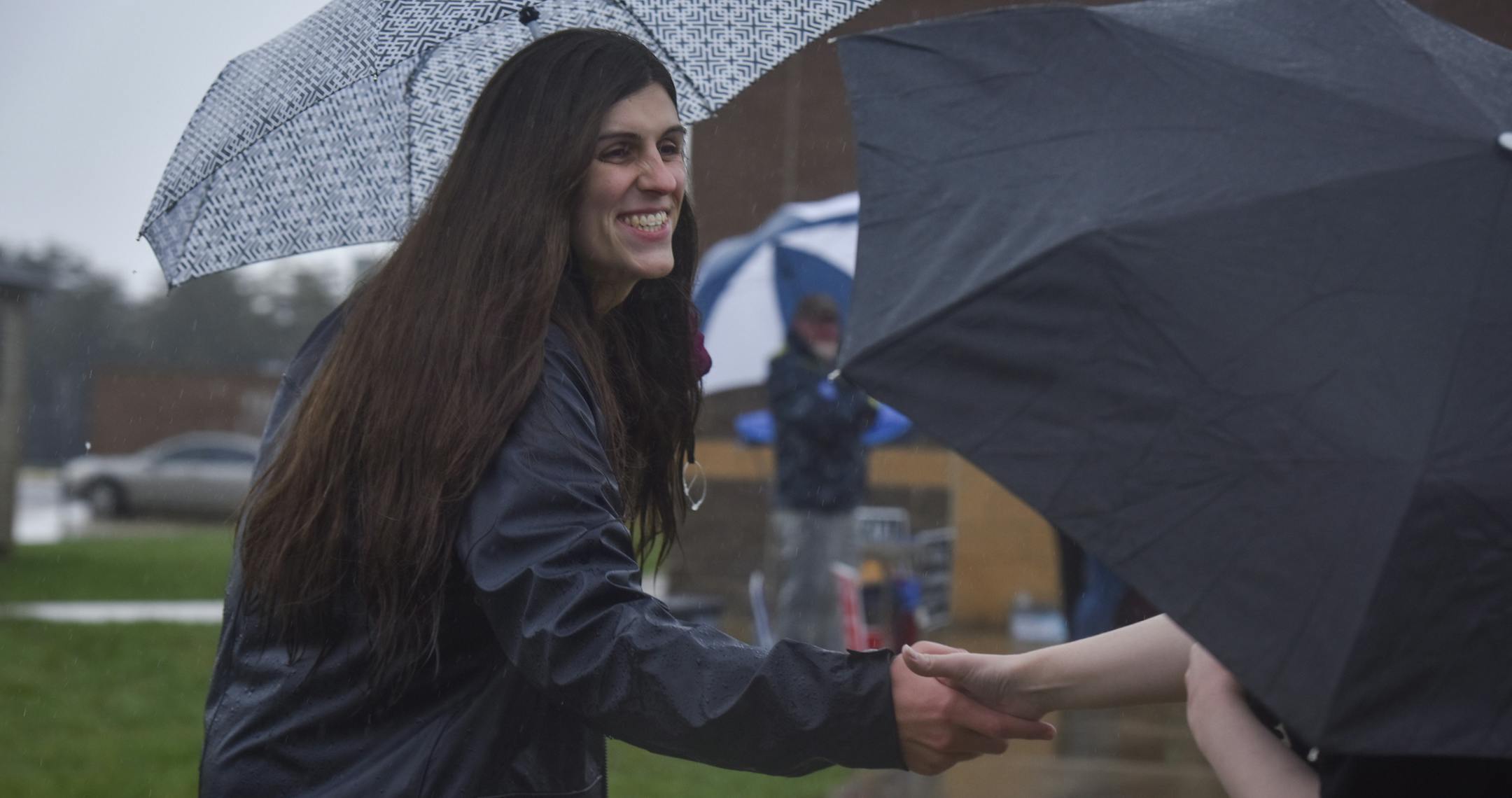 Danica Roem, who is running for house of delegates against GOP incumbent Robert Marshall, campaigns as voters take to the ballot boxes at Gainesville Middle School on Tuesday, Nov. 7, 2017, in Gainesville, Va. If Roem wins, she would be the first transgender legislator elected in the USA. (Jahi Chikwendiu /The Washington Post via AP)