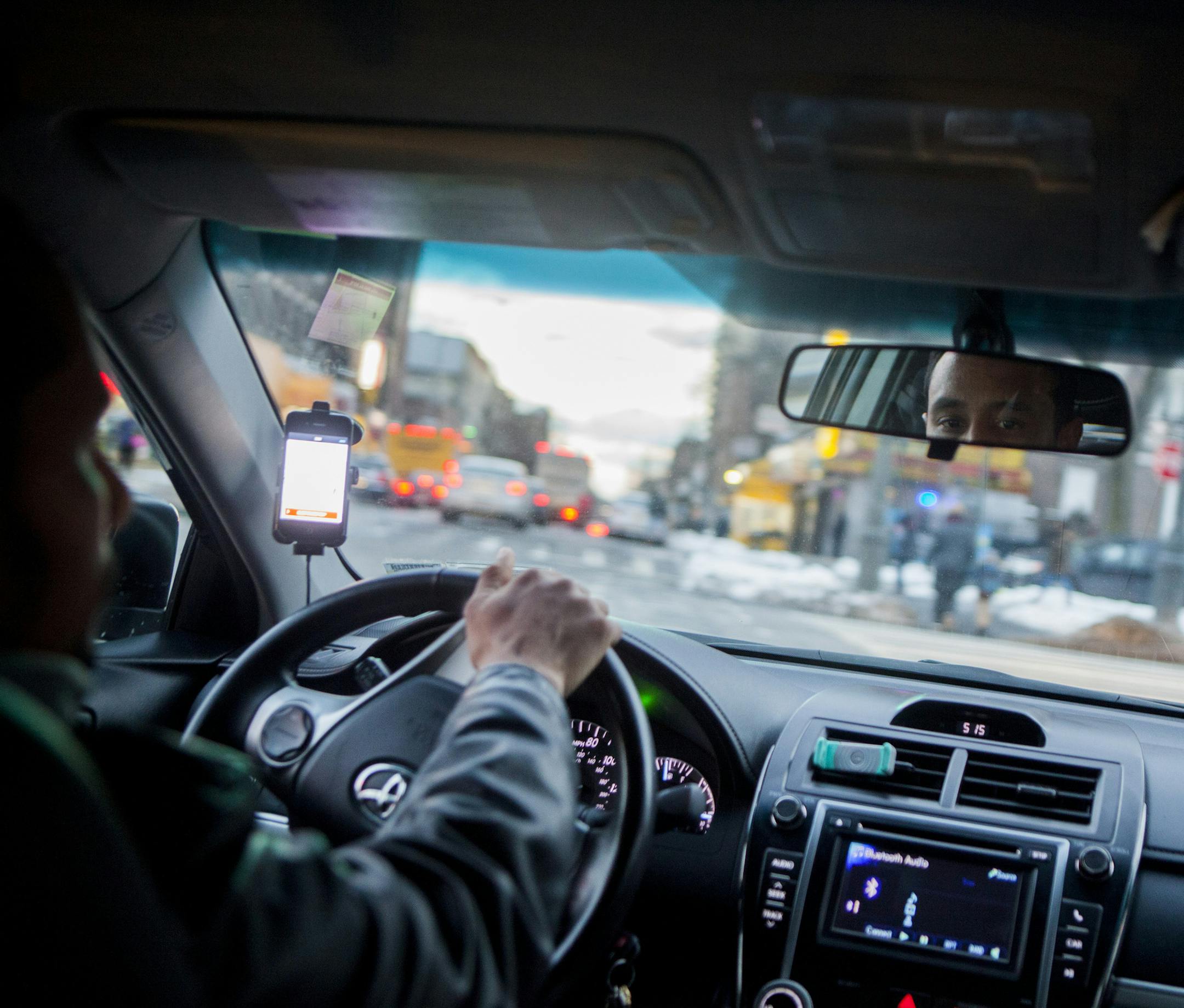 FILE ó An Uber driver maneuvers through the neighborhood of Crown Heights in New York, Jan. 30, 2015. The tax bill signed by President Donald Trump could let independent contractors like Uber drivers claim a 20 percent deduction on their earnings, but some labor advocates say the provision could ultimately hurt more workers than it helps. (Sam Hodgson/The New York Times)
