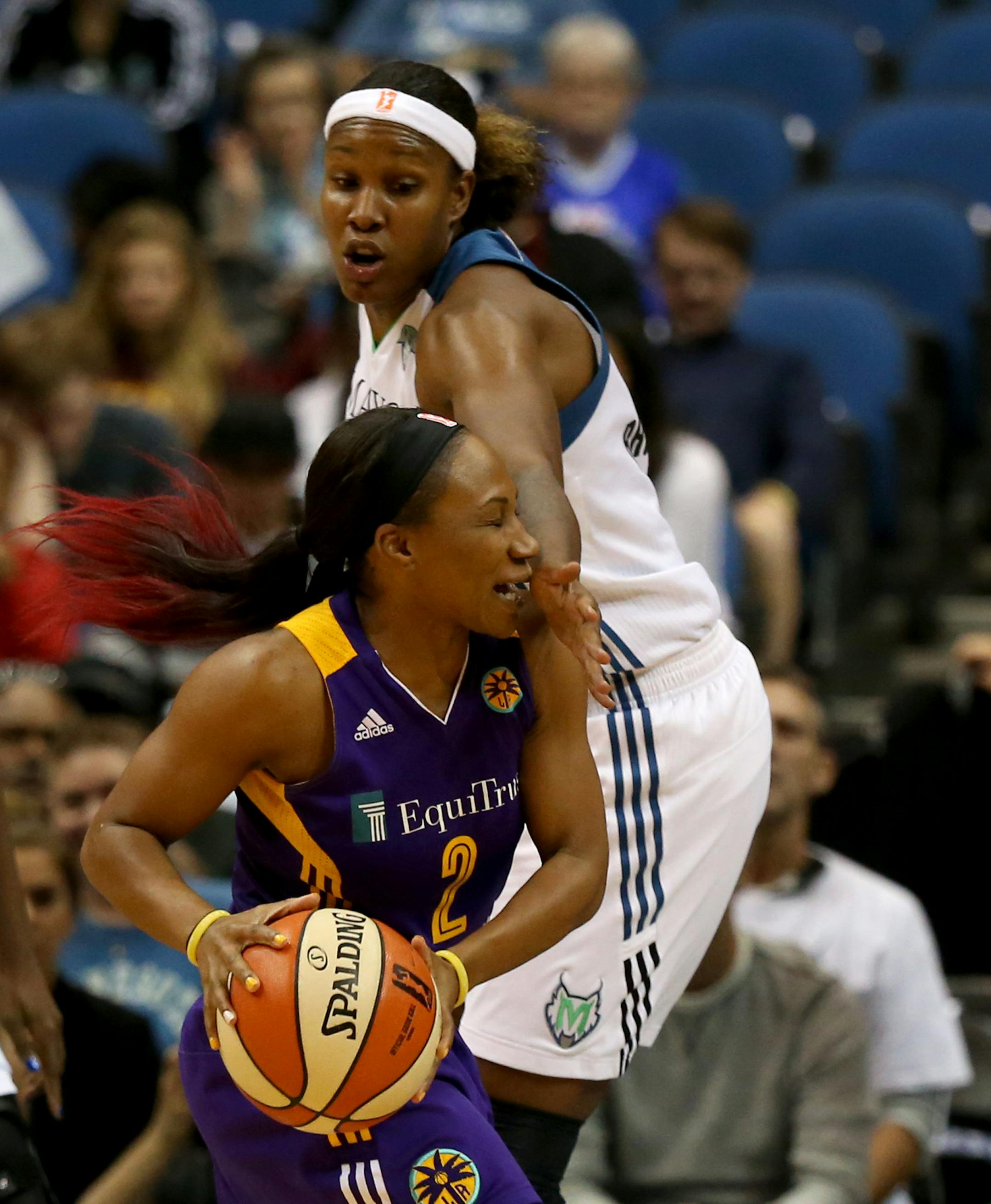 Lynx Rebekkah Brunson tried to block the pass of Temeka Johnson during the first quarter. ] (KYNDELL HARKNESS/STAR TRIBUNE) kyndell.harkness@startribune.com Lynx vs LA Sparks during the first round of the WNBA Playoffs at Target Center in Minneapolis Min., Friday September 18, 2015.