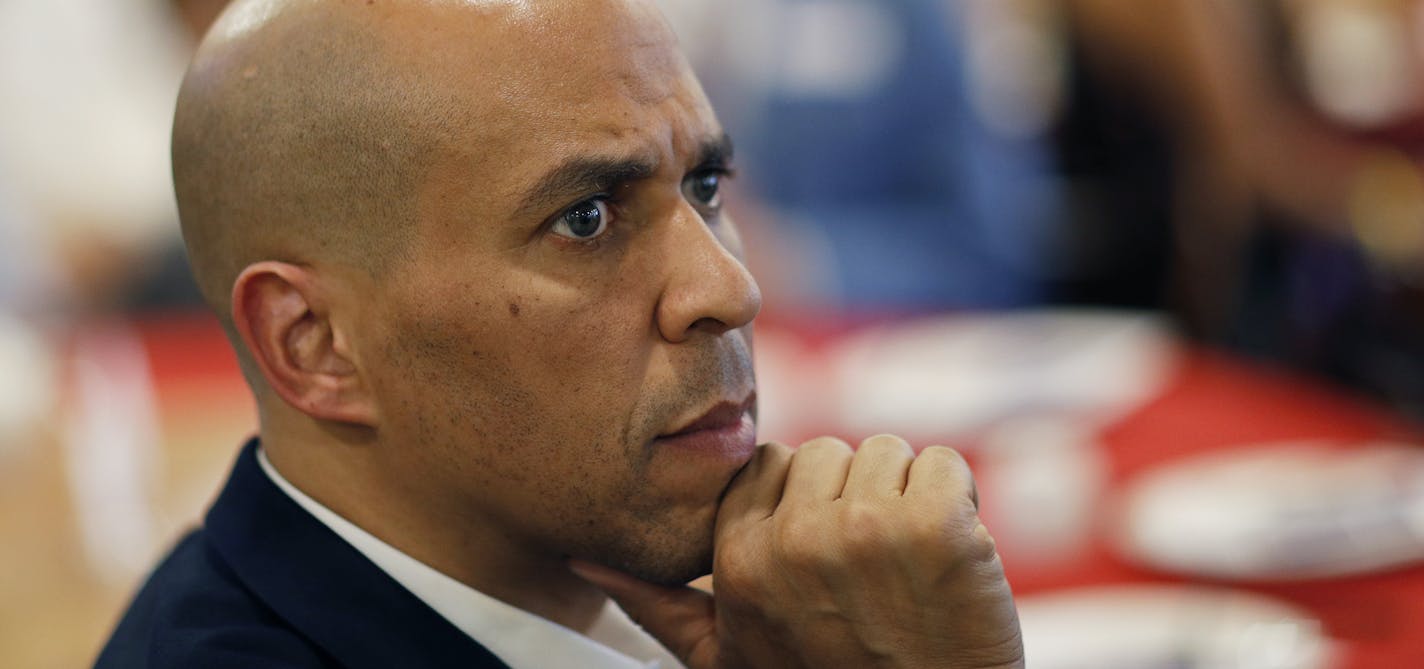 Democratic presidential candidate Sen. Cory Booker listens during a campaign event at a restaurant, Saturday, April 20, 2019, in Las Vegas. (AP Photo/John Locher)