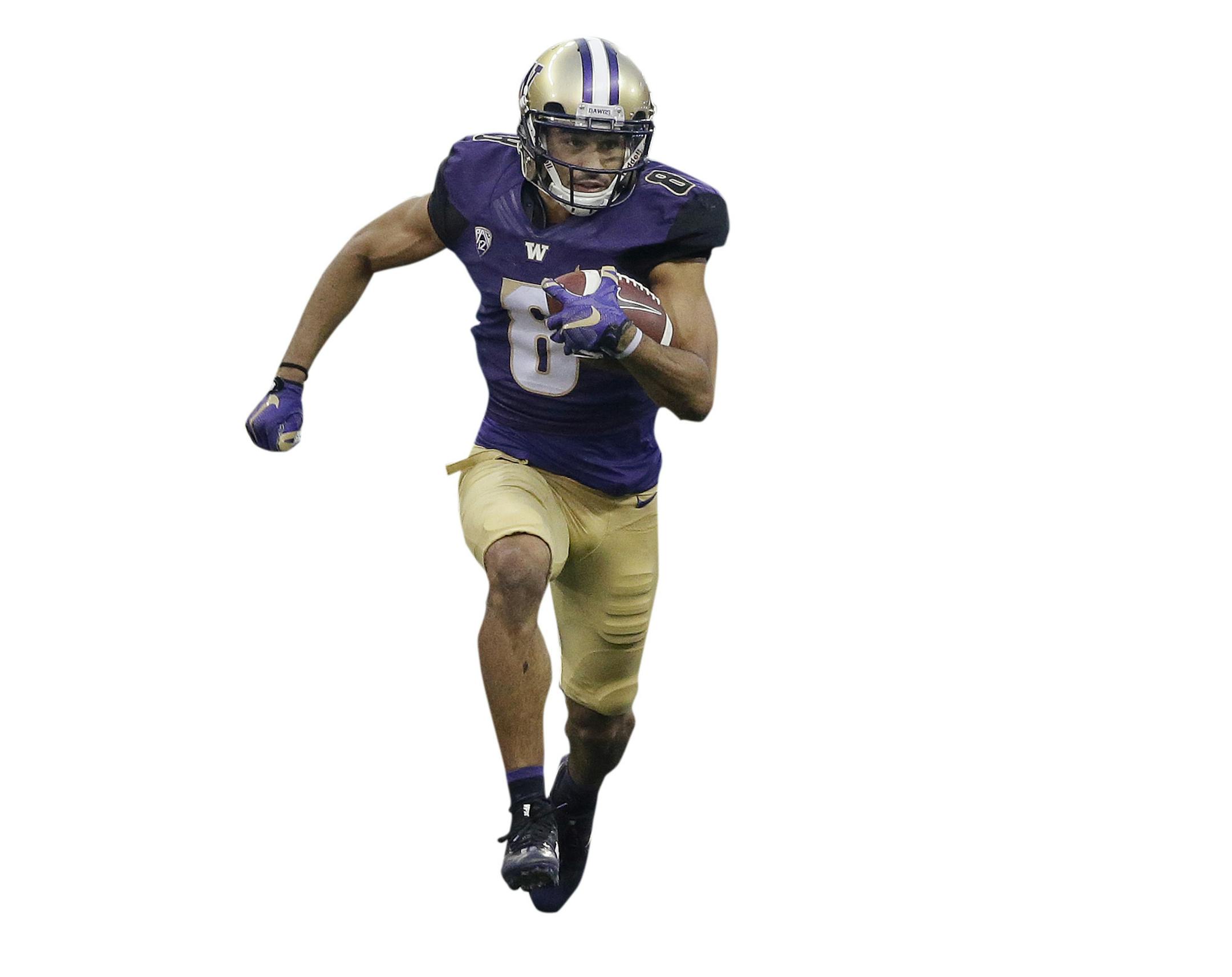 Washington's Dante Pettis (8) leaves several Fresno State defenders in his wake on his punt return for a touchdown in the first half of an NCAA college football game Saturday, Sept. 16, 2017, in Seattle. Pettis tied the NCAA career record for punt return touchdowns on the 77-yard return, the eighth of his career. (AP Photo/Elaine Thompson) ORG XMIT: WAET113