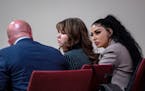 Hannah Gutierrez-Reed, center, sits with her attorney Jason Bowles, left, and paralegal Carmella Sisneros during testimony in the trial against her in