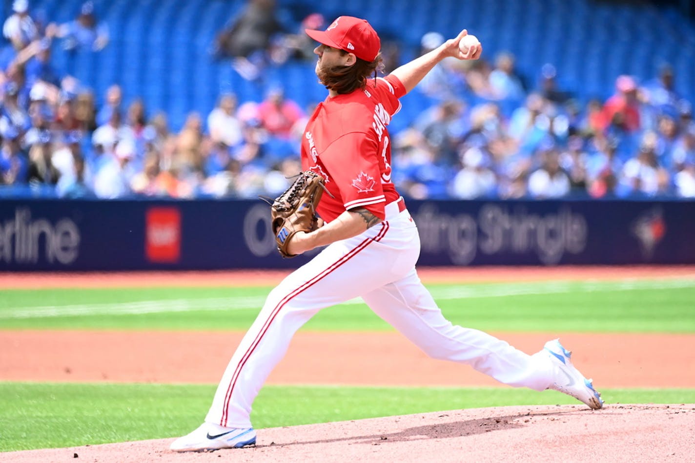 Toronto Blue Jays starting pitcher Kevin Gausman throws to a Minnesota Twins batter in the first inning Sunday.