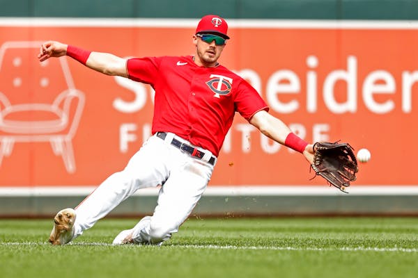 Minnesota Twins left fielder Trevor Larnach, above in a game in May, has a core muscle strain that led to the team putting him on the injured list on 