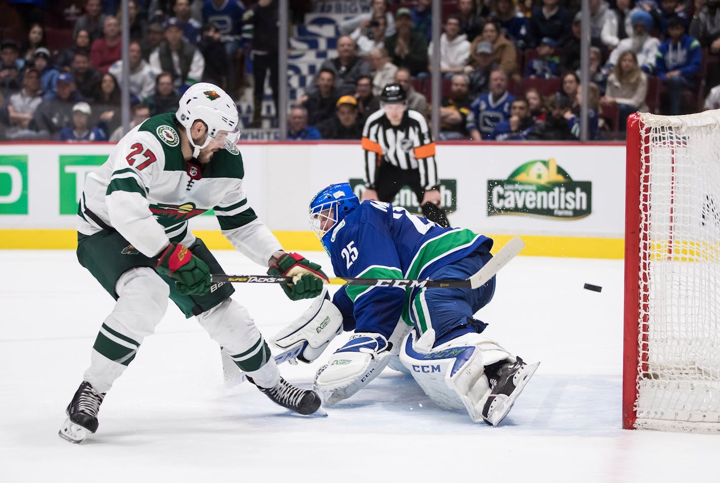 Wild winger Alex Galchenyuk -- after tying the score with a goal with less than five minutes remaining in regulation -- beat Canucks goalie Jacob Markstrom for the clinching shootout goal to give Minnesota a 4-3 victory Wednesday night in Vancouver.