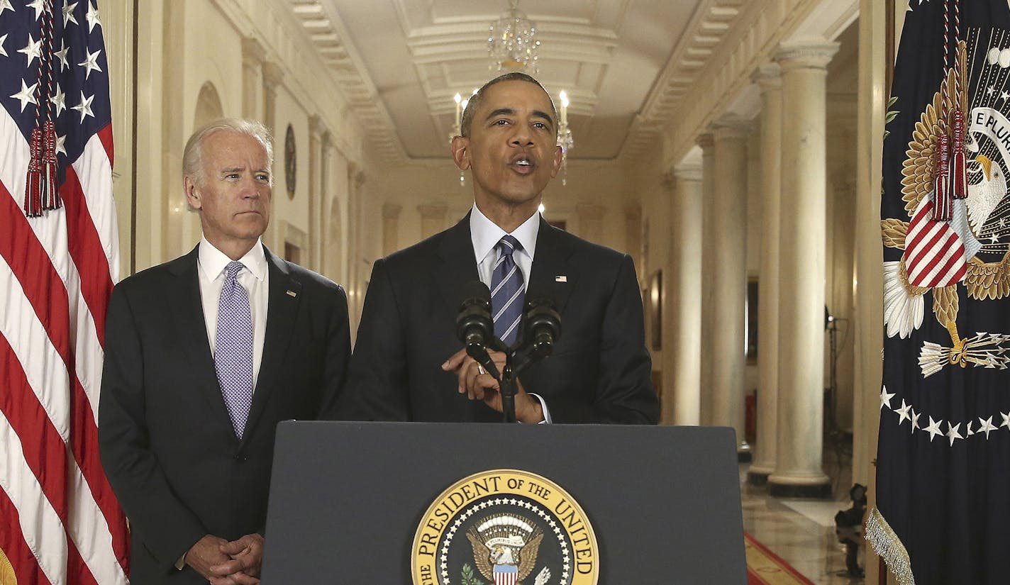 President Barack Obama speaks about a historic accord to significantly limit Iran&#xed;s nuclear ability that was reached, as Vice President Joe Biden looks on, at the White House in Washington, July 14, 2015. Obama&#xed;s statement, which was broadcast live in Iran, began what promised to be an arduous effort to sell the deal to Congress and the American public, saying the agreement was &#xec;not built on trust, it is built on verification.&#xee; (Andrew Harnik/Pool via The New York Times) -- F