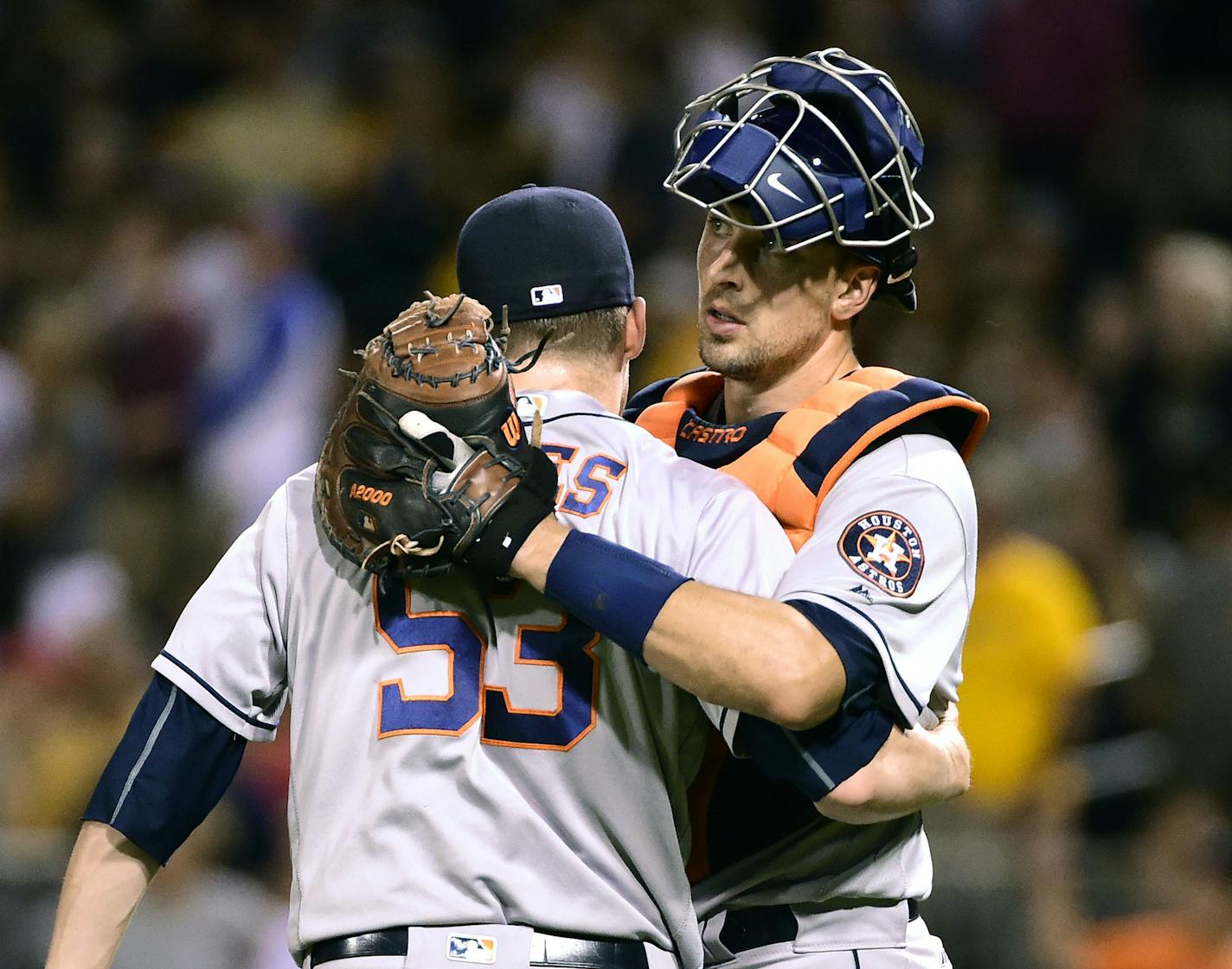 Houston Astros' Ken Giles, left, is hugged by Jason Castro after the Astros defeated the Pittsburgh Pirates 3-1 in Pittsburgh, Monday, Aug. 22, 2016. Giles picked up his fourth save of the season for the Astros. (AP Photo/Fred Vuich) ORG XMIT: PAFV111 ORG XMIT: MIN1611221837511601