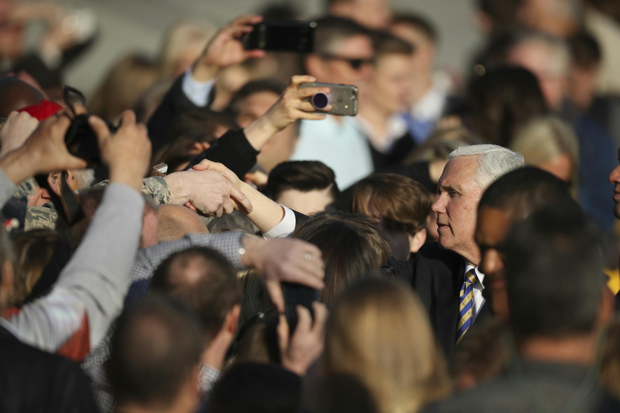 Vice President Mike Pence shook hands with one of the guests who had been waiting to greet him at the Minnesota National Guard - 934th Airlift Wing Tuesday afternoon.