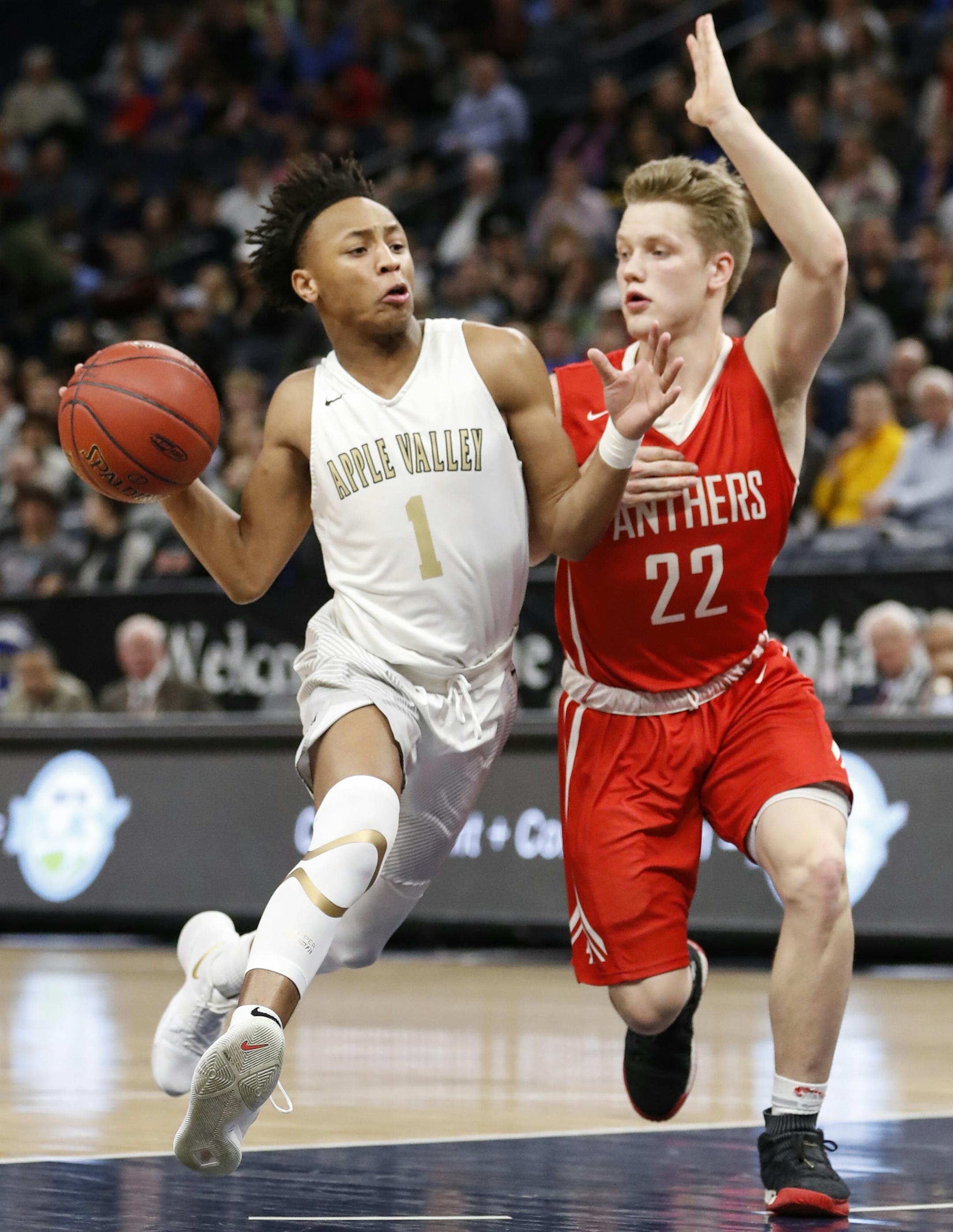 Apple Valley guard Josh Arnold (1) drives down court against Lakeville North guard Tommy Jensen (22) in the first half. ] RENEE JONES SCHNEIDER • renee.jones@startribune.com Apple Valley High School verses Lakeville North High School in the boys 4A semifinals at the Target Center in Minneapolis, Minn., on March 22, 2018.