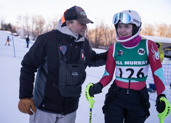 Hill-Murray coach Mark Windemer encouraged Natalia Mike after a run at Wild Mountain during a meet in mid-January.