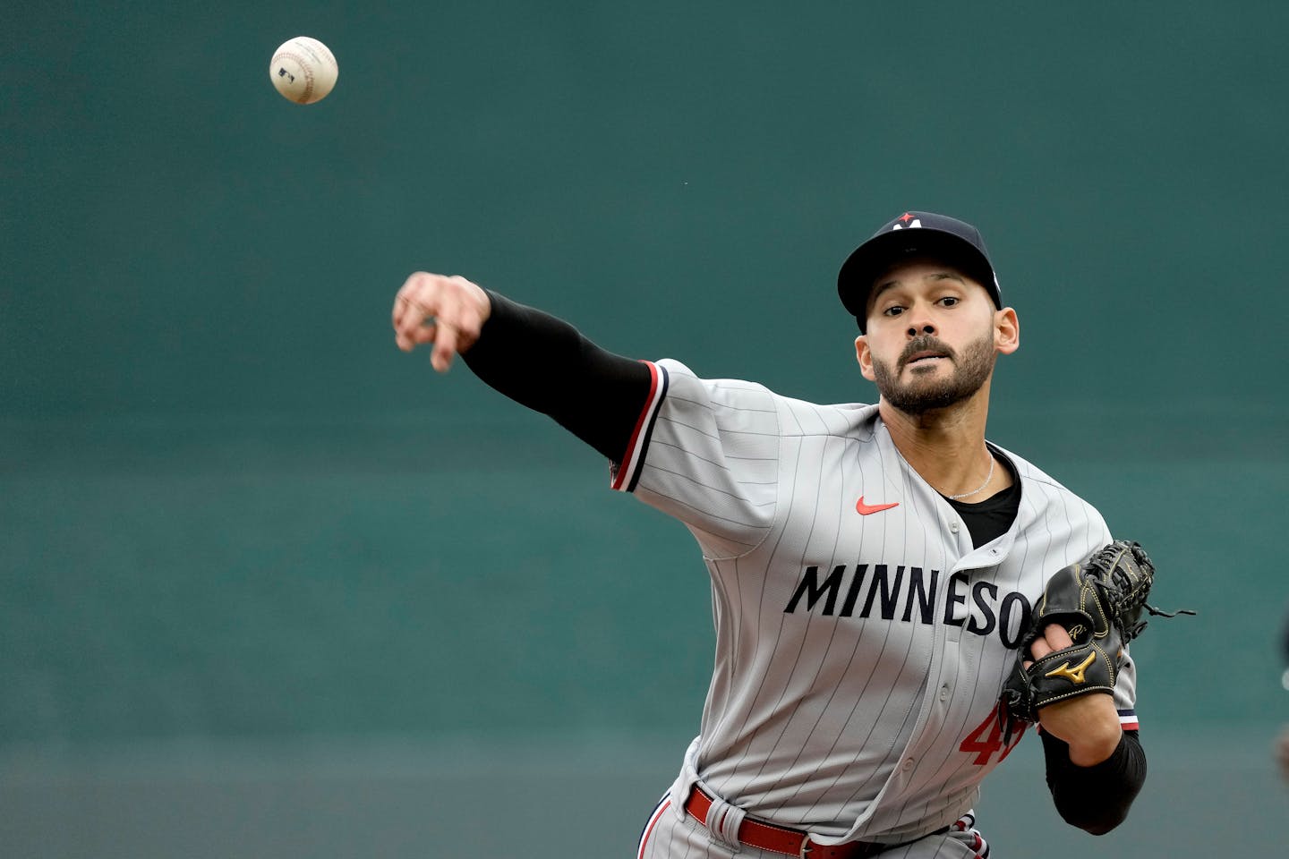 Minnesota Twins starting pitcher Pablo Lopez throws during the first inning of an opening day baseball game against the Minnesota Twins in Kansas City, Mo., Thursday, March 30, 2023. (AP Photo/Charlie Riedel)