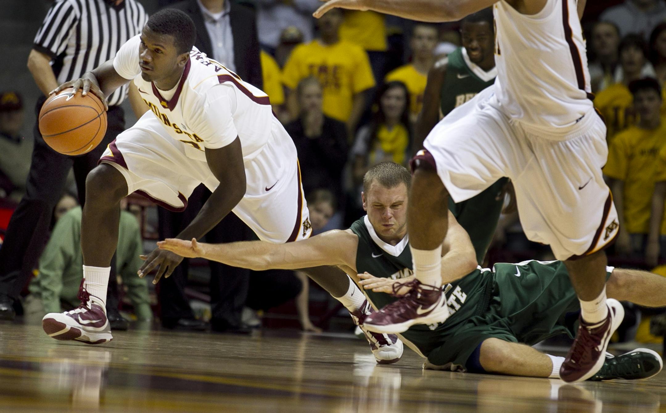 Minnesota's Chip Armelin stole the ball from Bemidji State's Bryce Tesdahl in the second half ofTuesday November 1, 2011 exhibition game between Minnesota and. Bemidji State.