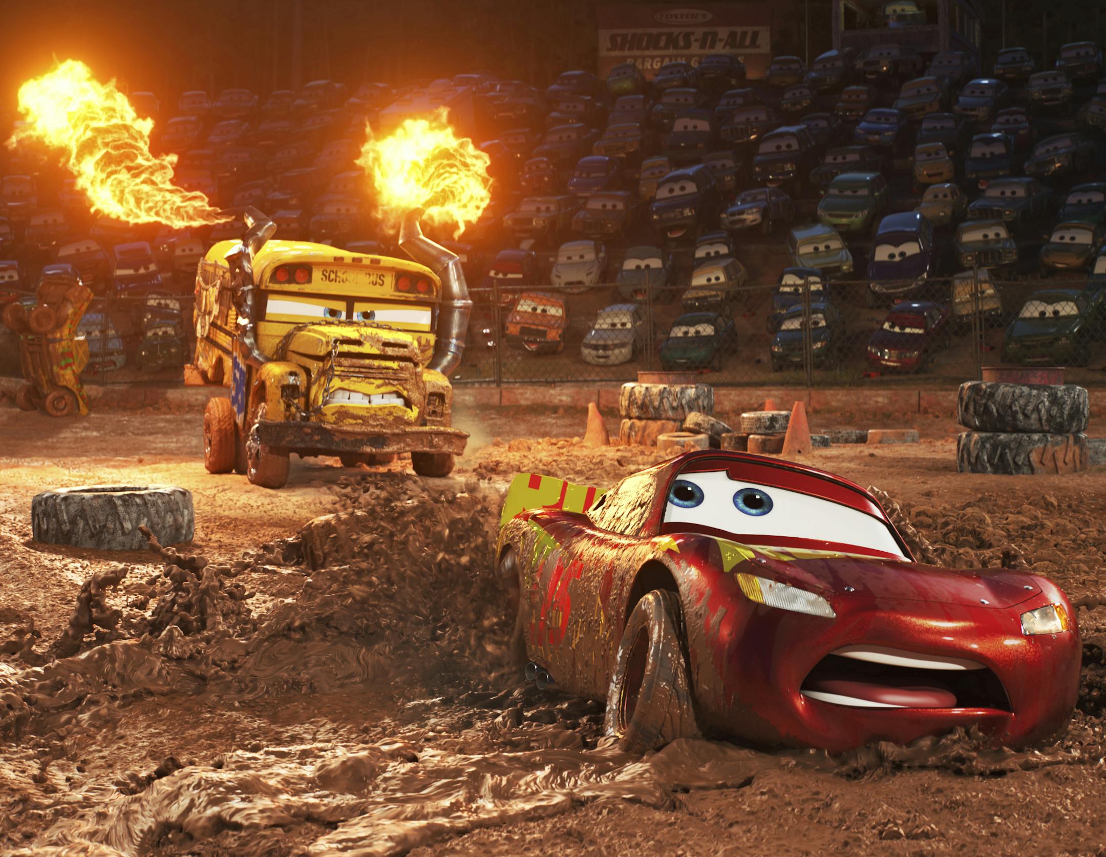 This image released by Disney shows Lightning McQueen, voiced by Owen Wilson, foreground, in a scene from "Cars 3." (Disney-Pixar via AP)