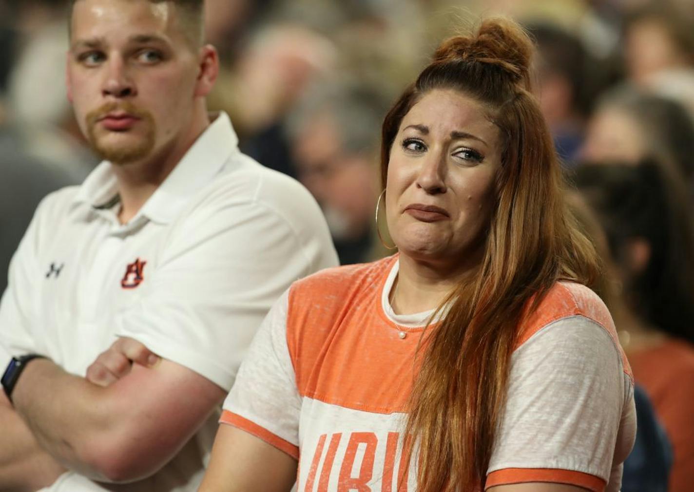 Auburn fans react after losing to Virginia.