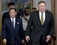 U.S. Secretary of State Mike Pompeo, right, and Kim Yong Chol, left, a North Korean senior ruling party official and former intelligence chief, return