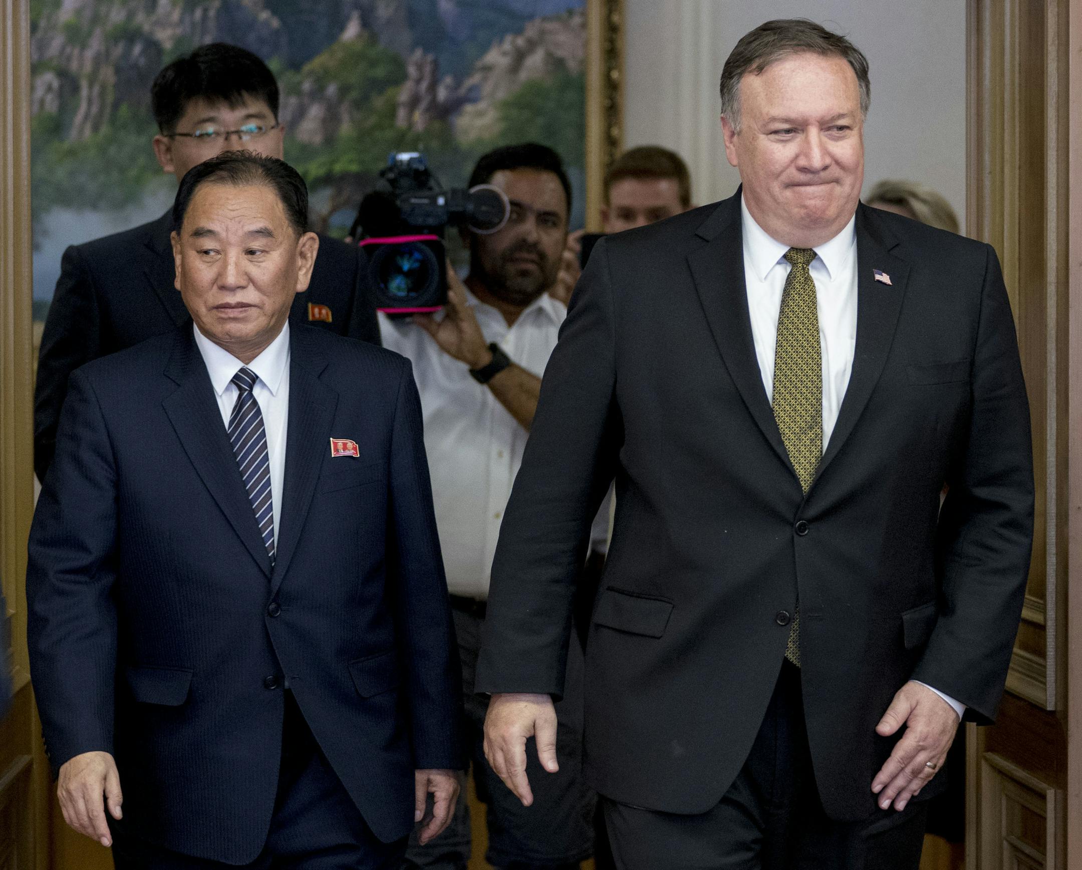 U.S. Secretary of State Mike Pompeo, right, and Kim Yong Chol, left, a North Korean senior ruling party official and former intelligence chief, return to discussions after a break at Park Hwa Guest House in Pyongyang, North Korea, Saturday, July 7, 2018. (AP Photo/Andrew Harnik, Pool)