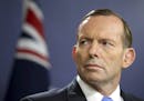 FILE - In this Sept. 19, 2014, file photo, former Australian Prime Minister Tony Abbott speaks during a press conference, in Sydney. Australia's Prime