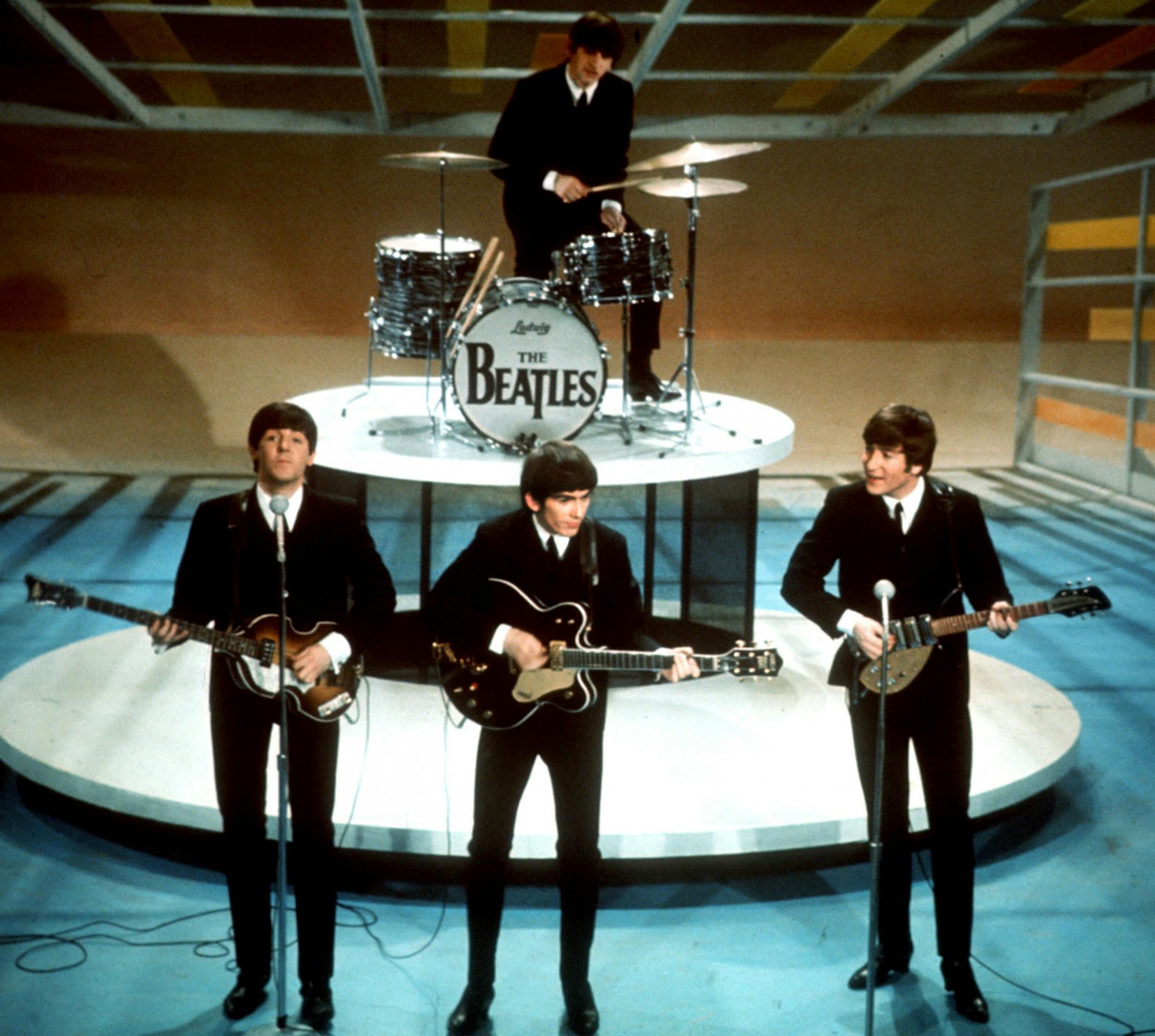 FILE - In this Feb. 9, 1964, file photo, The Beatles, from left, Paul McCartney, George Harrison, Ringo Starr on drums, and John Lennon perform on the CBS "Ed Sullivan Show" in New York. The Beatles made their first appearance on "The Ed Sullivan Show," America's must-see weekly variety show, on Sunday, Feb. 9, 1964, and officially kicked off Beatlemania.