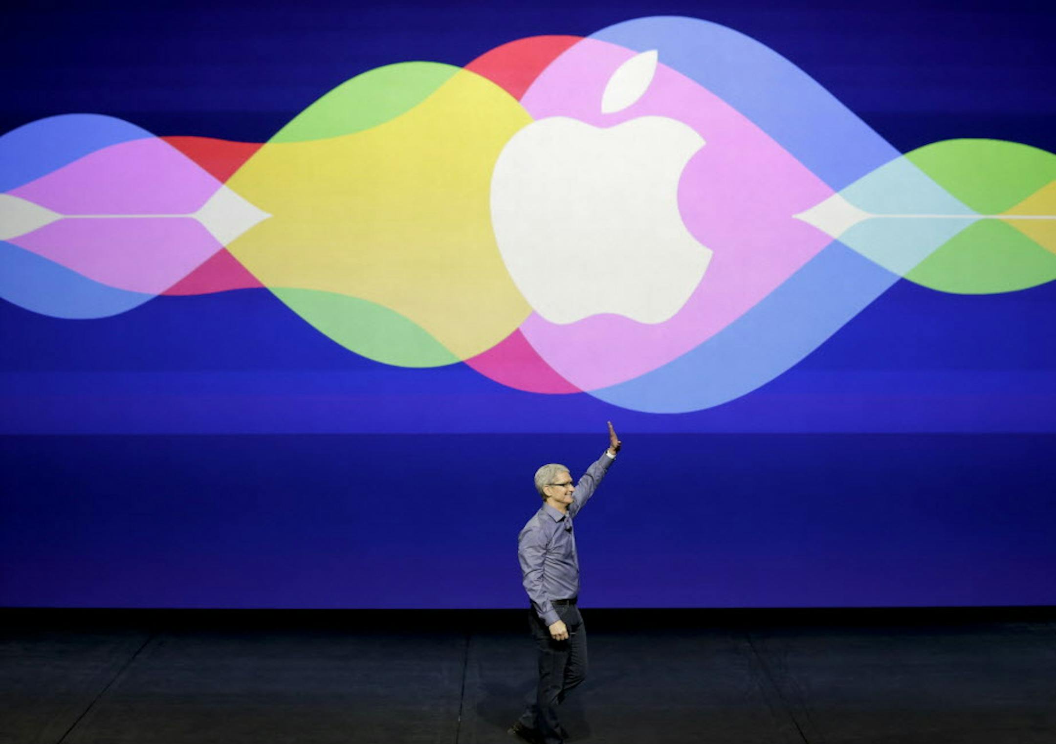 Apple CEO Tim Cook waves during the Apple event at the Bill Graham Civic Auditorium in San Francisco, Wednesday, Sept. 9, 2015. (AP Photo/Eric Risberg)
