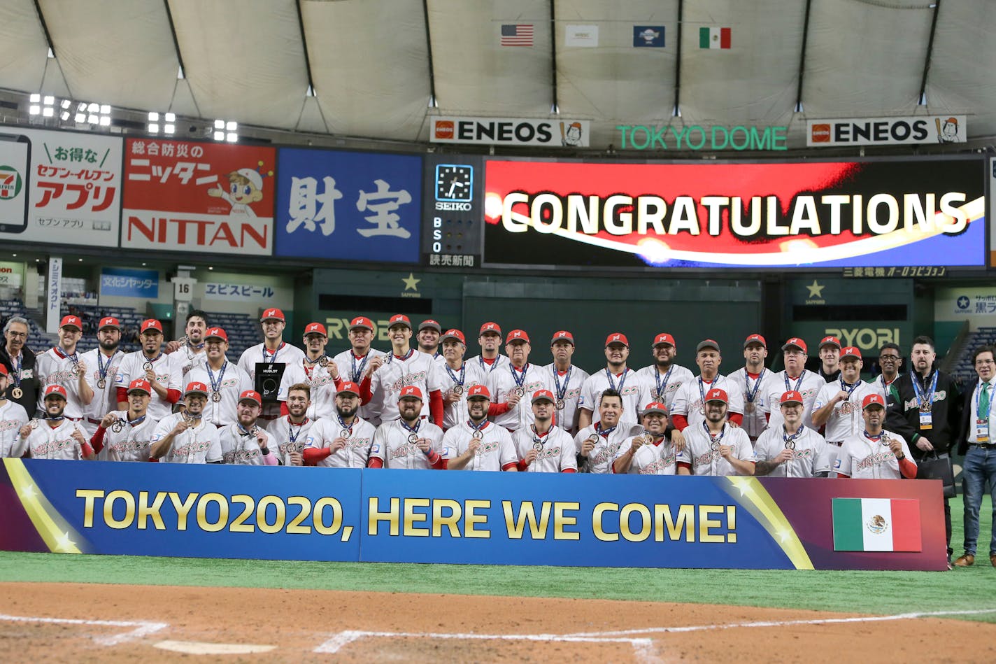 Mexico's players pose for a group photo during a medal award ceremony after beating the United States 3-2 in their Premier12 baseball tournament bronze-medal game at Tokyo Dome in Tokyo, Sunday, Nov. 17, 2019. (AP Photo/Toru Takahashi)