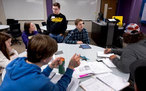 Students work during a study session for an accounting class in January 2024 at Minnesota State Mankato. The university announced cuts to academic pro