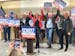 Jen Schultz (center) announced Tuesday in Duluth that she will run against Rep. Pete Stauber for the Eighth District Congressional Seat. She was backe